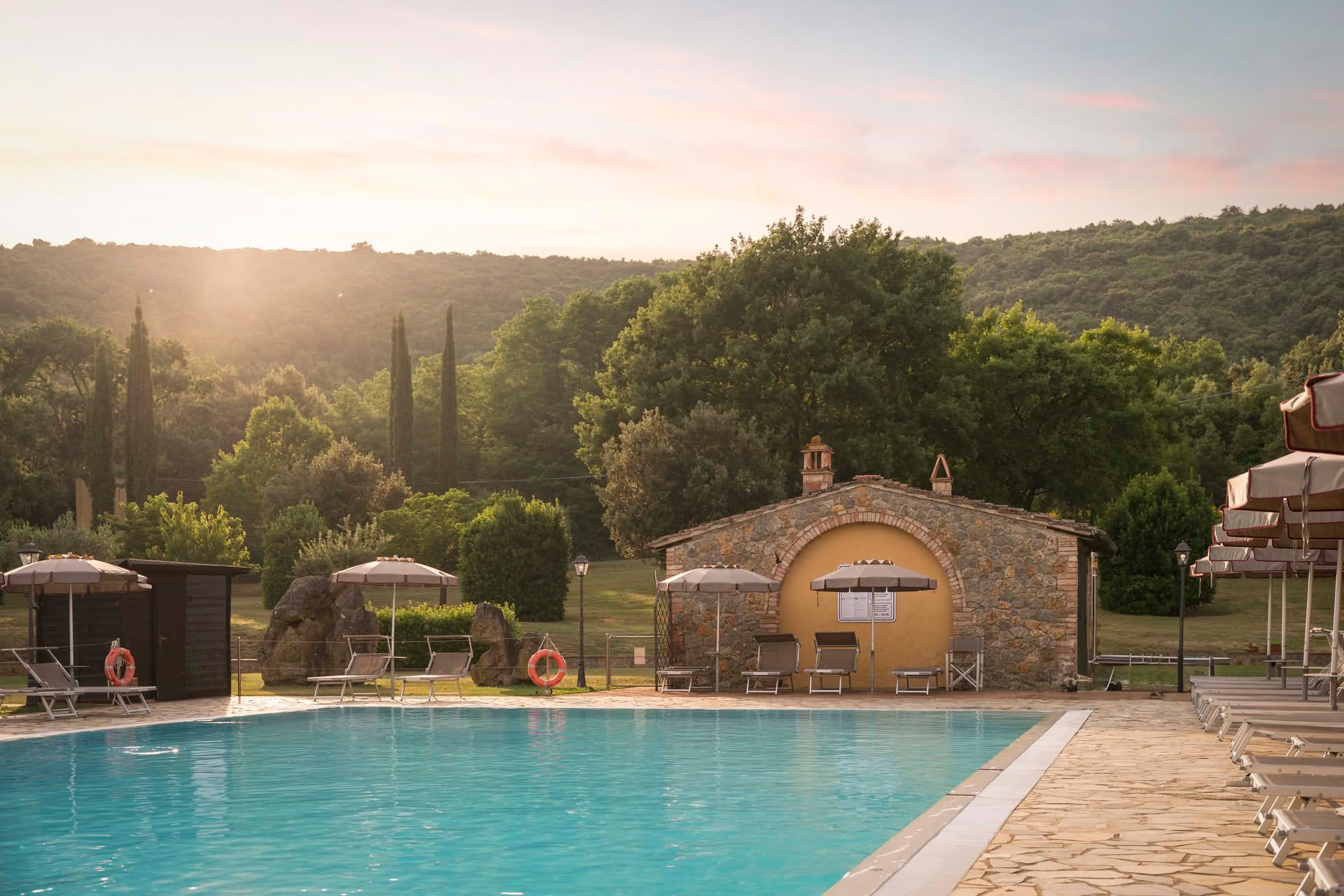Outdoor swimming pool at Casolare Terre Rosse