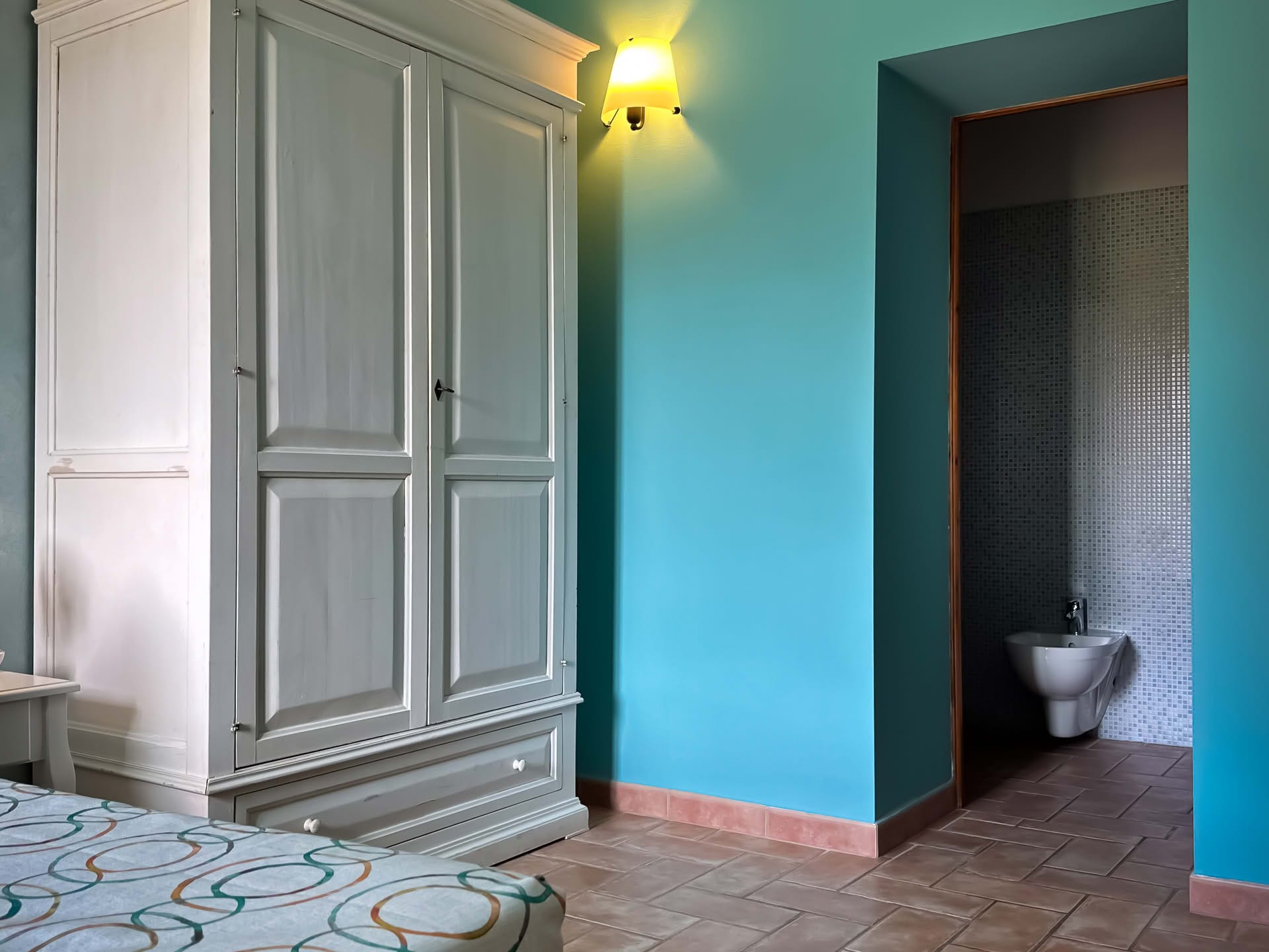 Detail of the bedroom wardrobe in the Cipresso Apartment at Casolare Terre Rosse