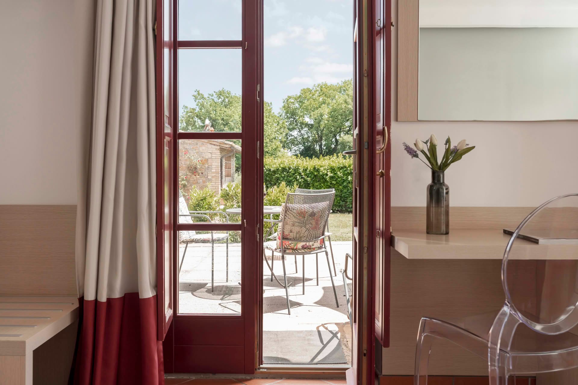 Detail of the view of the private garden from the Garden Room at Casolare Terre Rosse