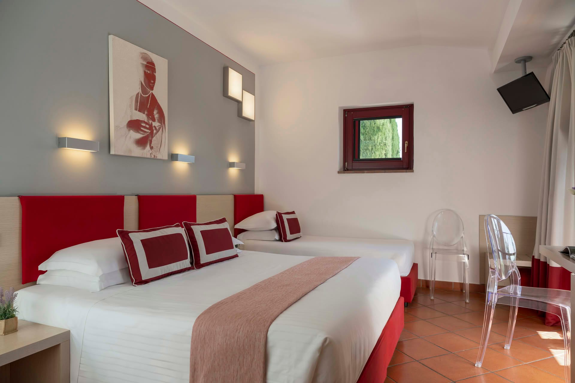 Comfort Room at Casolare Terre Rosse with double bed and extra bed