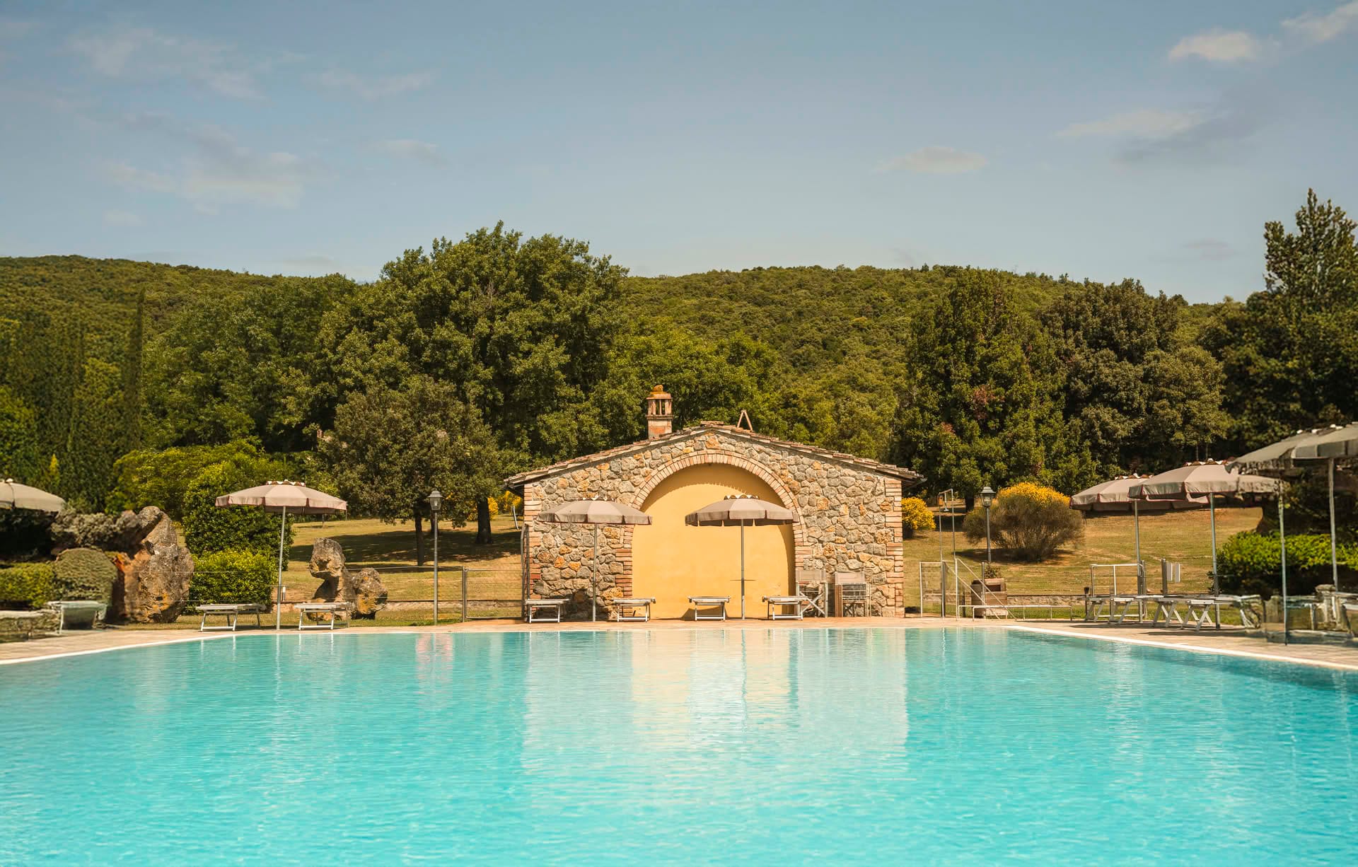 Outdoor swimming pool at Casolare Terre Rosse
